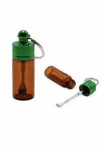 Botella de cristal con cucharita